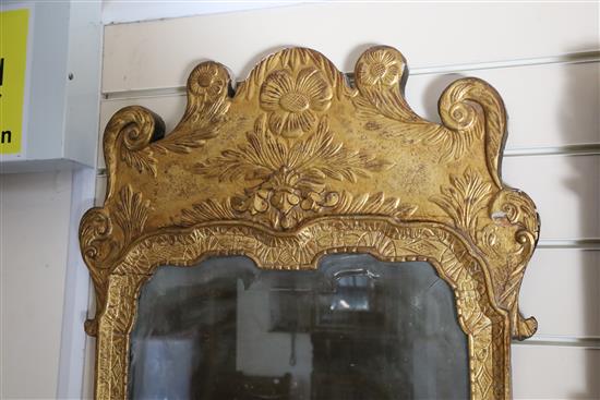 A George II giltwood and gesso wall mirror, W.1ft 10in. H.3ft 3in.